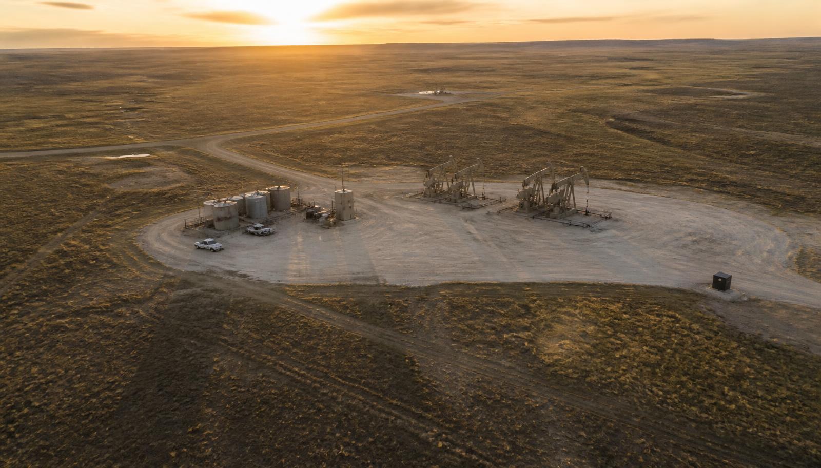 Aerial view of a production pad and lease roads
